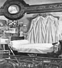 At Les Buissonnet: the bed, books, toys, and tea set and pictures of St. Therese